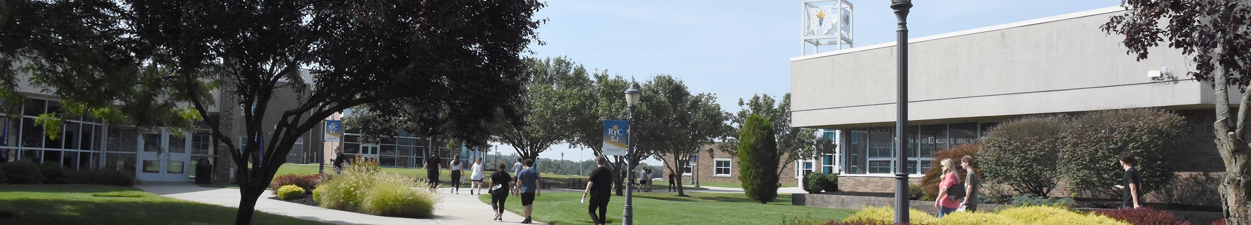 STEM Students in classroom and in front of MEC Building