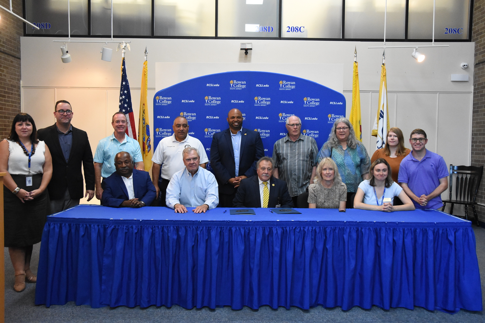 Rowan College staff & Foundation Board members, and family & Friends at the signing Ceremony