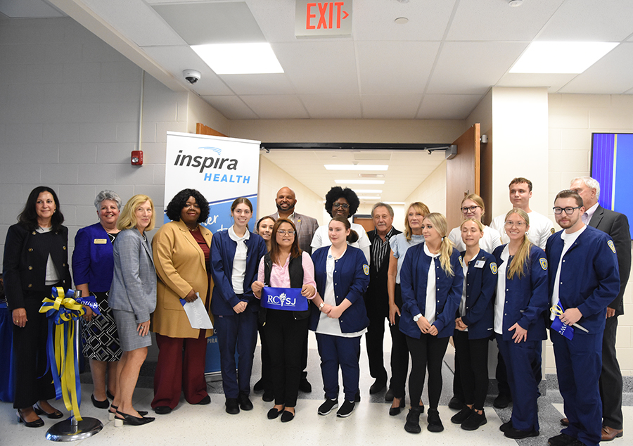 RCSJ, Inspira, and county officials pose with event speaker and second-year nursing student, Theeranut “Apple” Krzyminski (pictu