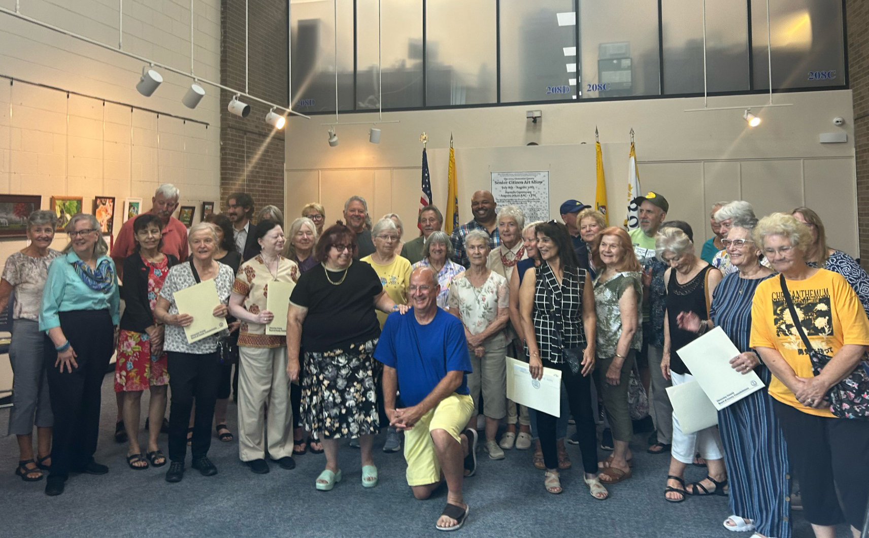 Artist at 2024 GC Senior Citizen Art Show Awards ceremony